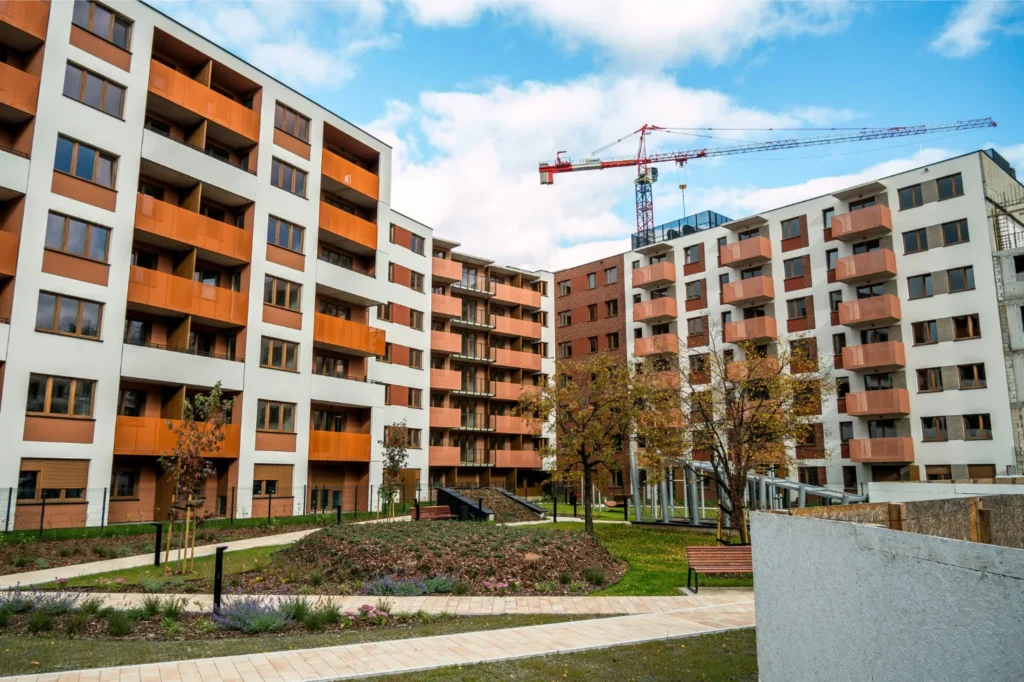 Modern commercial apartment complex highlighting pest risk in multi-tenant buildings